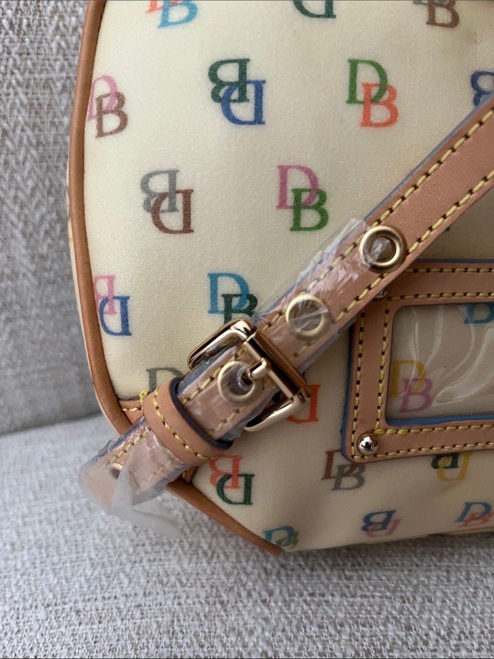 NWT Dooney & Bourke Cream Multicolor Logo Coated Canvas Backpack with Tan Trim - Picture 3 of 14
